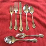 7 Oneidacraft Deluxe Melinda 5 Pc Place Setting 2 Free Dinner Fork. Fixed Price $17.17.