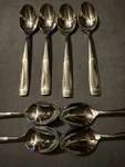 Oneida Stainless - Glossy Moda Set Of Four Dinner And Teaspoons. Fixed Price $25.00.