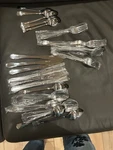Oster 24 Piece Stainless Steel Flatware 6 Forks Knife Large & Small Spoons. Fixed Price $50.00.