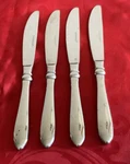 Farberware Stainless FRW28 Lot Of 4 Dinner Knives 9 3/8". Fixed Price $15.00.