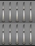 Oneida Stainless Distinction / Fireside Dinner Knives - Set Of 10. Fixed Price $20.99.