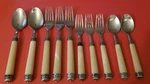 10 Hampton Silversmiths HSV83 Stainless Forks Spoons White Pearl Plastic Handles. Fixed Price $16.50.