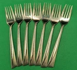 Set Of 7 Essentials Stainless ESN4 Pattern Salad Forks 6 1/4" Japan. Fixed Price $22.00.