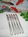 5 International Silver Superior Dynamic Stainless Steel Dinner Knives. Fixed Price $17.98.