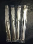 (4) New Modern Solid Knife 9 In. Love Knot (stainless, 13%) By Farberware. Fixed Price $19.35.
