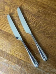 Two Robert Welch Kingham Dinner Knives 18/10 Stainless Steel Glossy. Fixed Price $19.99.