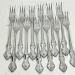 12 Piece Eldan Japan Stainless Silverware Cocktail Forks Appetizer Set ELD20 Vtg. Fixed Price $18.95.