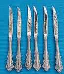 6-ONEIDA Stainless Southern Baroque Steak Knives 9 1/8". Fixed Price $30.00.