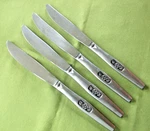 Nasco Stainless 4 Dinner Knives Black Rose Pattern Japan Textured #71787. Fixed Price $17.99.