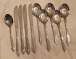 Farberware Stainless Flatware FRW2 10 Pieces 4 Knives, 5 Soup Spoons, Teaspoon. Fixed Price $25.00.