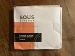 Cheese Slicer, W/ Extra Wires. Sous Kitchen, Open Box, Never Used. Fixed Price $7.50.