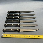 Set Of 6 Pfaltzgraff Serrated Steak Knives. Fixed Price $25.00.