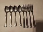Oneida Stainless Steel Hughes 4 Spoons & Forks. Fixed Price $19.00.
