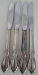 4 Wm Rogers & Son Victorian Rose Silverplate Steak / Dinner Knive. Fixed Price $14.95.