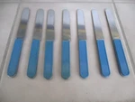 7 Mcm Mikasa MIS31 Blue 8 1/4" Dinner Knives Plastic Hdl. Stainless Center Japan. Fixed Price $19.99.
